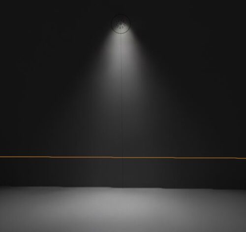 An IES light shines on a plane used as a background in Blender.