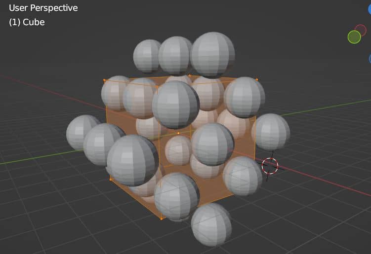 Spheres are placed on a cube using geometry nodes in Blender.