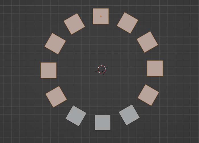 A cube is arrayed in a circular radial pattern in the Blender 3D viewport. 